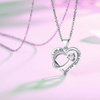 Load image into Gallery viewer, Engraved words &quot;love heart&quot; on an 18k white gold pendant necklace
