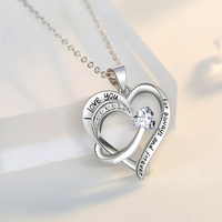 Load image into Gallery viewer, Engraved words &quot;love heart&quot; on an 18k white gold pendant necklace
