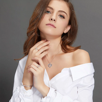 Load image into Gallery viewer, Engraved words &quot;love heart&quot; on an 18k white gold pendant necklace
