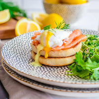 Load image into Gallery viewer, Elegant Black &amp; White Dot Stoneware 12-Piece Dinnerware Set
